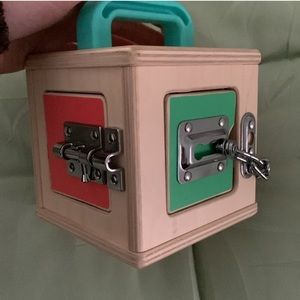 Bundle of lovevery lockbox and 3 topper drop box with coins, carrots and q tips